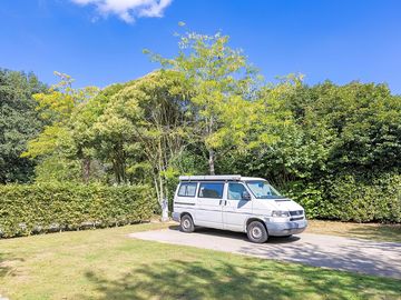 Spacious touring pitch with electricity