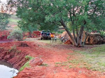 Flat campsite next to the dam