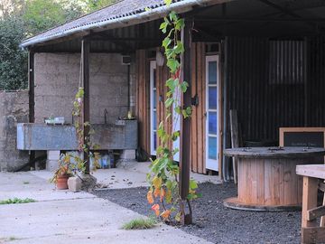 Toilet block from the camping kitchen and pizza oven area