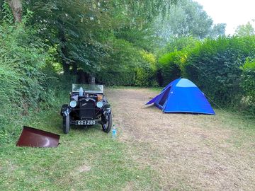 Pitch surrounded by trees and hedges