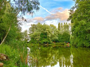 Visitor image of the view from the far side of the lake looking back at the communal kitchen.