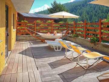 The bar terrace is the perfect place to relax and enjoy the views