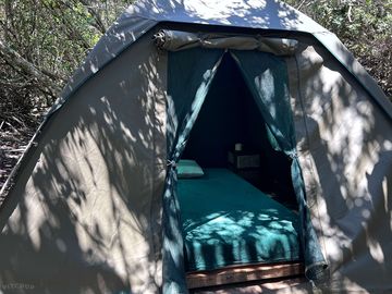 Double bed inside the rental tent