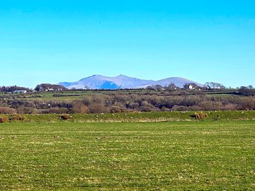 View of Snowdonia from the site