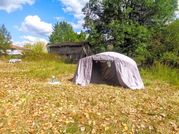 Grass tent pitch