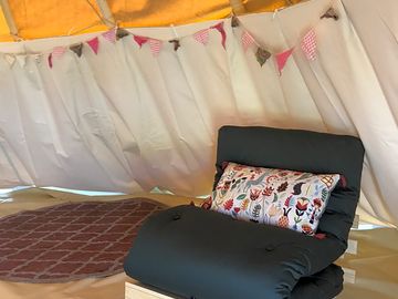Inside the Tipi, futon bed