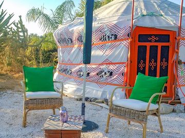 Yurt exterior and outside seating area