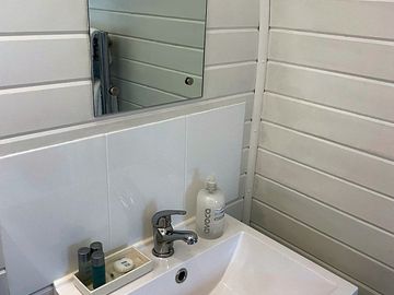 Ensuite shower room in our glamping pod with complimentary toiletries