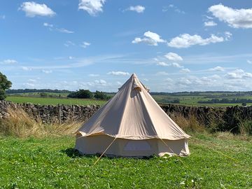 Exterior of the bell tent and beautiful views