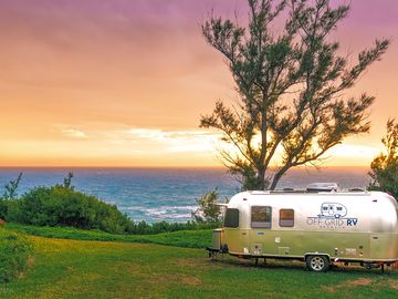 Solar-powered RV by the coast