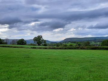 View from centre of field, overlooking the ithon valley and hills in the distance