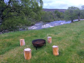 Firepit overlooking the river garry