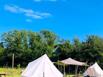 Outside of the bell tents