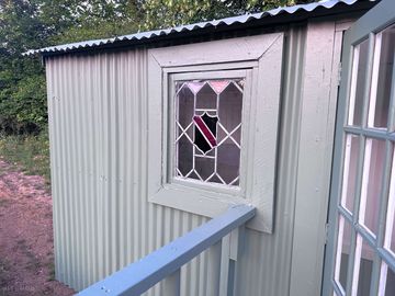 Tinks shepherd's hut by the stream