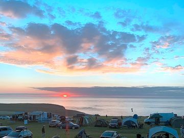 Sunset over the sea, sea views from every pitch