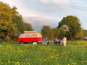 Relaxing outside a campervan