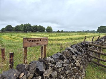 Entrance sign to poynton cross farm