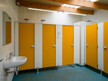 Bathroom with toilets and showers