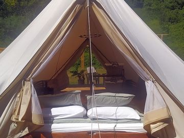 View of the sleeping area in the bell tent.