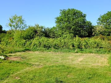 Non-electric grass tent pitch