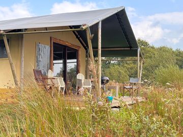 Relax and enjoy the view of beautiful rolling hills from your terrace