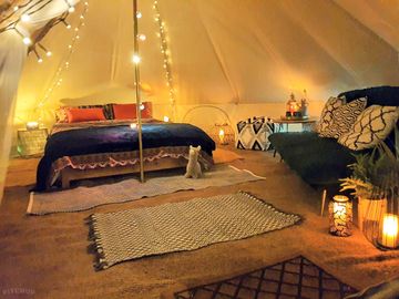 Lit up interior of the bell tent