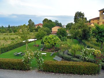 Pretty garden with picnic tables and hammocks