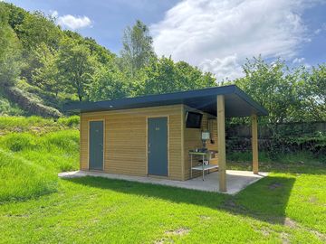 Shared shower and bathroom block