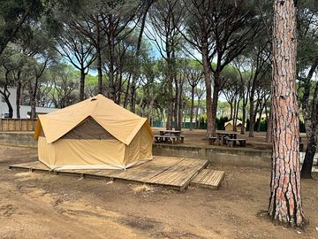 Glamping tent on a wooden platform
