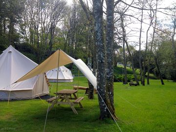 Bell tent with picnic table