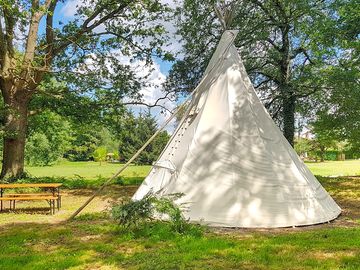 Tipi on a partially shaded pitch