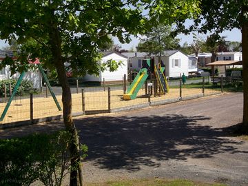 Playground with swings and a slide