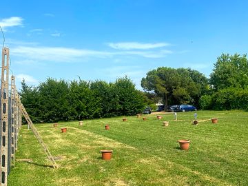 Electric hardstanding and grass pitch