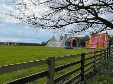 Touring field with event tent and inflatables