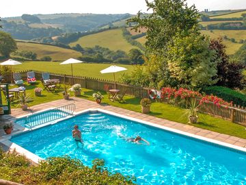 Warm outdoor pool on site