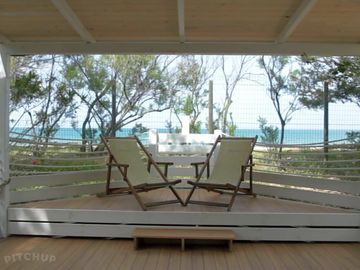 Veranda overlooking the beach and the sea