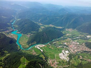 View of the soča river and the nearest town of tolmin which is 5km from the campsite