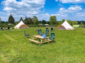 Picnic bench and camping chairs provided