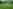 Non-electric grass and earth tent pitch 
