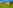 Powered grass travel trailer campsite 