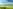 Electric grass touring pitch (sea view)