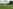 Non-electric grass and earth tent pitch 