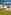 Electric optional hardstanding and grass touring pitch 