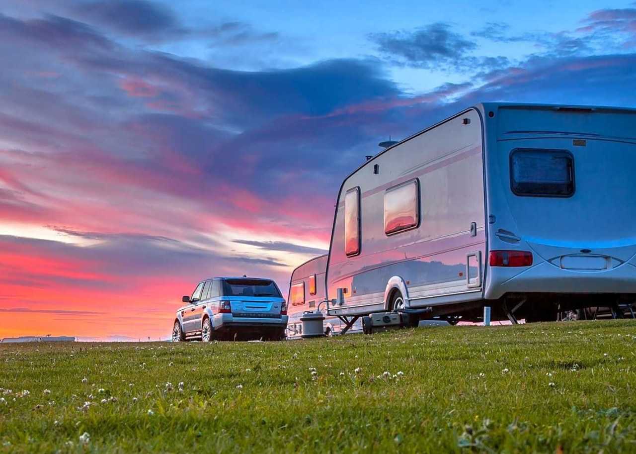 Stay in a caravan and you can go camping without any fiddly setting up