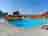 Camping La Garenne de Moncourt: Pool with slide and sun deck