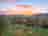 Cumblands Farm Caravan Site: Visitor image of The orchard at sunset