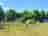 Heathfield Farm Camping: Grass pitches and site entrance