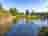 Glentrool Camping and Caravan Site: Looking across the pond to the pitches