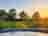 Colemere Caravan Park: Hot tub at sunset