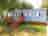 Camping Playa De Ris: Static caravan exterior
